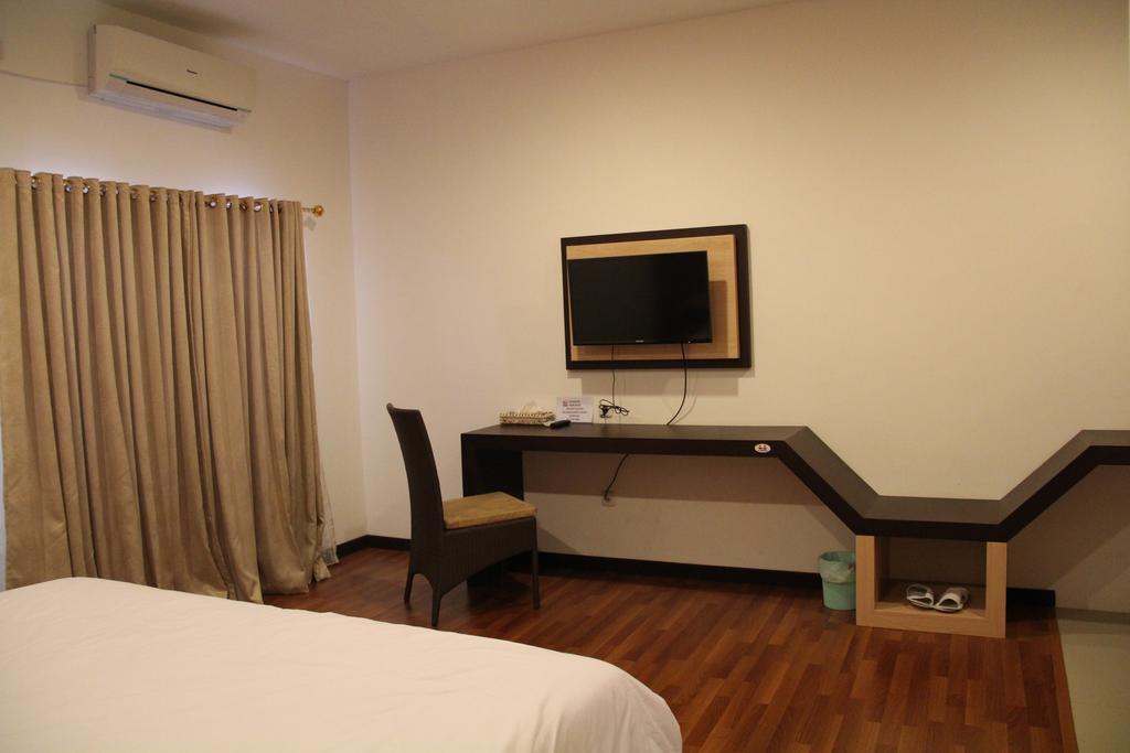 Kampoeng Nelayan Hotel Palu Pokoj fotografie